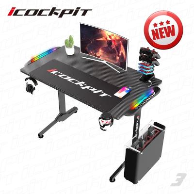 China Hot Selling Icockpit Carbon Fiber Gamer Board Custom Modern Black Adjustable Gaming Desk (Other) Cheap Gaming Table With Multi Colors RGB Lights for sale