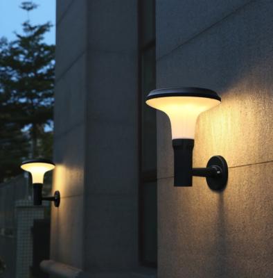 China Yard Garden IP55 Waterproof Dimmable Outdoor Decor 2W Led Solar Wall Light for sale