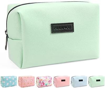 China 2021 Fashion Cheap Custom Floral Mini Green Zipper Leather Travel PU Cosmetic Bag for sale