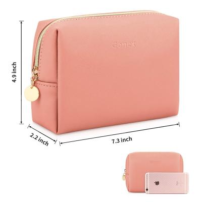 China Fashion Low MOQ Women Waterproof PU Cheap Wholesale Hot Pink Leather Cosmetic Bag for sale