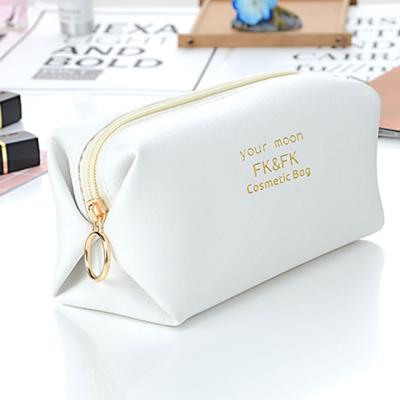 China High Quality Custom Made White PU Leather Small Shape Fashion Ladies Travel Cosmetic Bag for sale