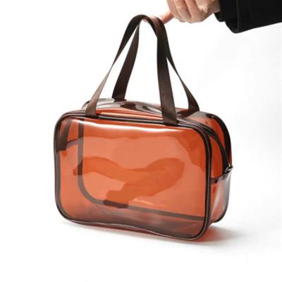 China Fashion Travel Large Waterproof Transparent PVC Make Up Brush Storage Bag Pink Toiletry Wash Bag for sale