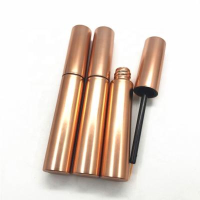 China Eco-friendly Fast Shipping Gold Eyelash Glue Metallic Empty Mascara Cream Eyeliner Tubes Cosmetic Packaging Bottle With Magic Wand for sale