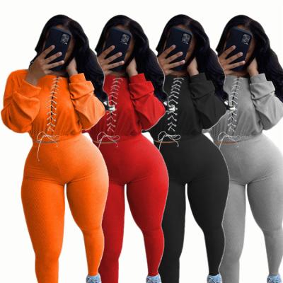 China Breathable Two-Piece Pants Set Winter Apparel Women Clothes 2021 Trending Bandage Sweat Suits Women Joggers Suits Set Lace Up Hoodies for sale