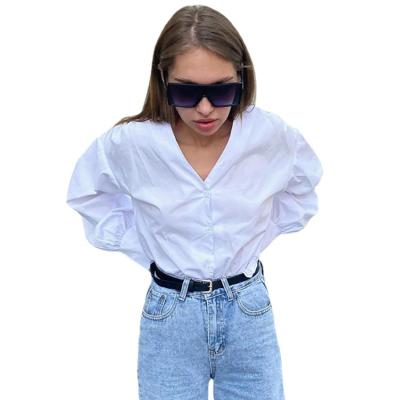 China French customer's top V-neck white shirt women's anti-pilling early spring temperament new pleated loose slim top for sale