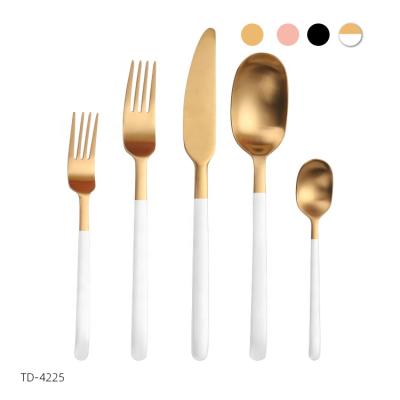 China Sustainable Flatware White And Gold PVD Coating White Stainless Steel Cutlery Set for sale