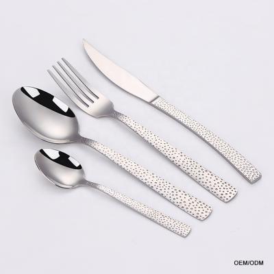 China Viable Bubble Hole Shape Handle Cutlery Set OEM Stainless Steel Flatware Dinnerware Set Cutlery Set for sale