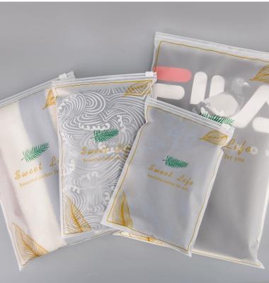 China Disposable Custom Printed Logo Frosted Clear Zipper Plastic Packaging Clothing Bag for sale