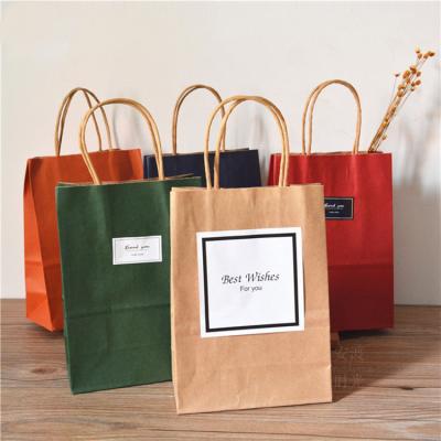 China Custom Recycled Brown Materials Factory Price Gift Christmas Kraft Paper Shopping Packaging Bag for sale