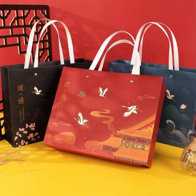 China Recycled Materials Bolsa de papel Wholesale Shopping Paper Bag and Gift Bag and Patterned Bag with Handles for sale