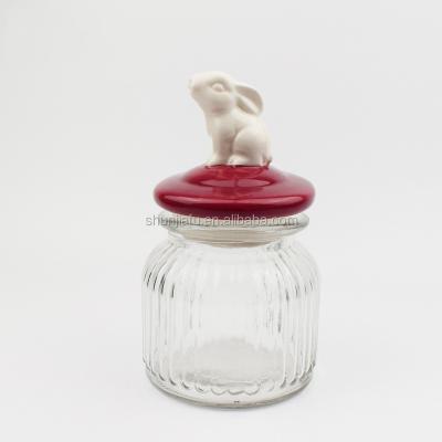 China Viable Colorful Ceramic Glass Candy Jar Lid Wholesale Rabbit Glass Jar for sale