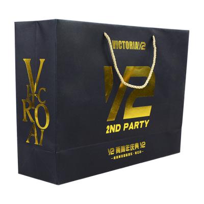 China Recyclable Materials Hot Foiled Stamping Black Logo Paper Recycled Shopping Bag With Own Logo Fashion Gift Suitcase for sale