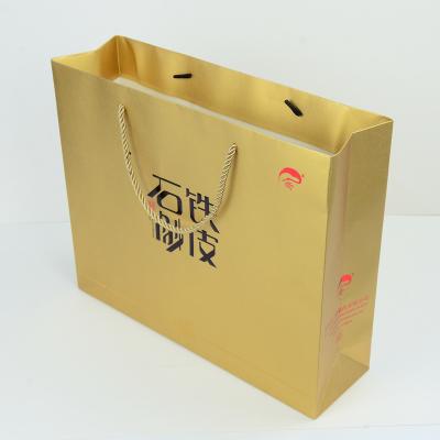 China Recycled Materials Customized Logo Paper Bag Luxury Shopping Paper Bags With Your Own Logo for sale