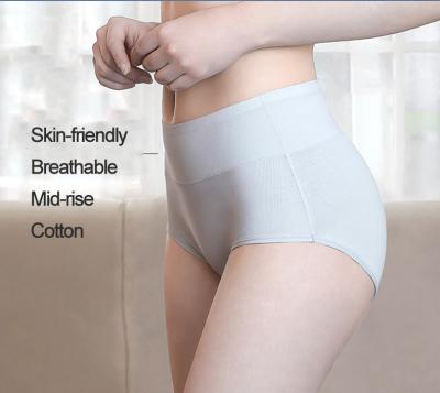 China Custom Logo Cotton Antibacterial Mid Waist Hip Breathable Women Briefs Lifting Solid Color Panties Women Cotton for sale