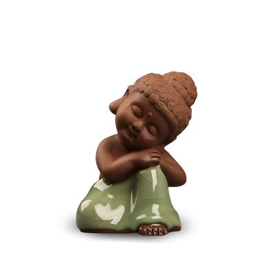 China Southwest ge parboil small buddha tea pet tea set tea ceremony utensil can open a piece of tea lifting car home small buddha ornament for sale