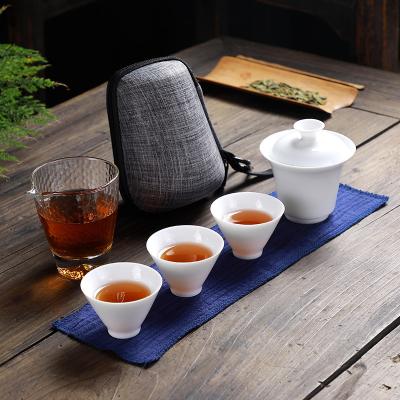 China Sustainable Chinese Traditional Tea Cup Set Travel Ceramic Tea Cup Set With Bag Modern White Convenient Tea Cup Set For Travel for sale