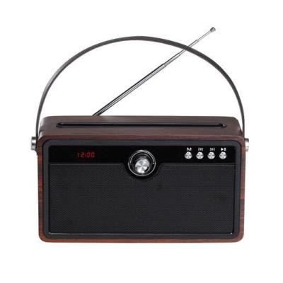 China Retro FM Radio Portable Home Wireless USB Slot Wireless Speaker Wooden Material Home Radio for sale