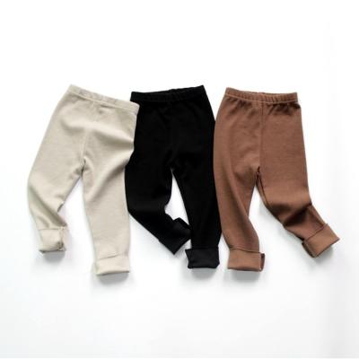 Cina Korean tight stretch pants boys and girls gaiters autumn and winter anti-pilling children use cotton gaiters in vendita