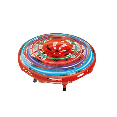 China 2021 New RC Hobby Child Spinning Toys Sensor UFO Flight Ball Gun Top Infrared Shooting Drone With Colorful Light for sale