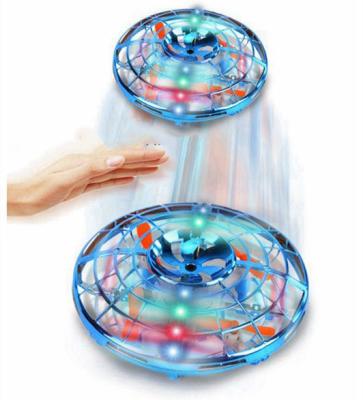 China 2021 RC Hobby New Kid Spin Top Toys UFO Flying Ball Radio Control Toys Sensor Drone With Colorful Light for sale