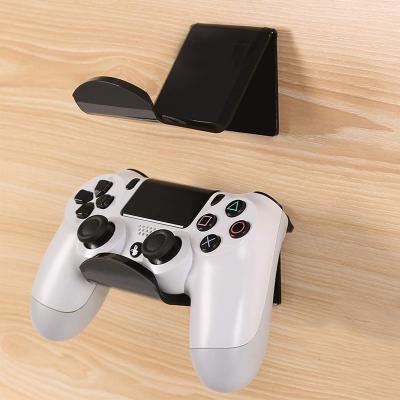 China Wall Mount Acrylic Holder For PS5 PS4 Xboxes Swtch Controller Wall Mount Game Controller Stand Holder For PS4 Controller Headphone Holder Universal Design Gamepad Holder for sale