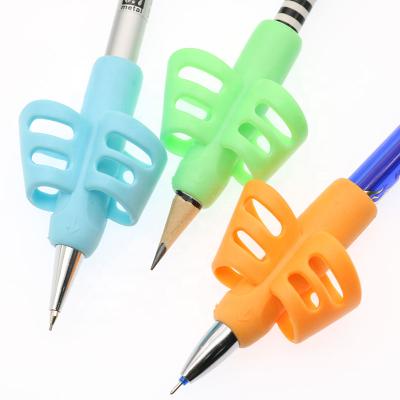 China Topper Amazon Hot Sale Two-finger Grip Silicone Baby Learning Writing Tool Pencil Grips For Kids Writing for sale