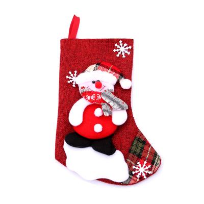 China Christmas Decorations In Different Types Cartoon Image Stocking Luxury Christmas Stockings Gifts Bag Christmas Stockings for sale