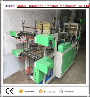 China Plastic 2 Roll Out Sealing Cold Break Hot Bottom Sealing Bag Making Machine for sale