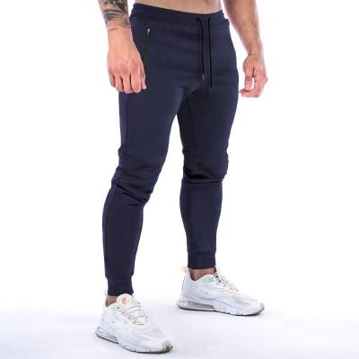 China Custom Anti-Wrinkle Mens Cotton Stretch Tights Fitness Pants Skinny Basics Male Gym Sport Pants Running Sweatpants for sale