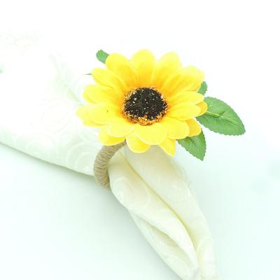 China Sustainable Exquisite Wedding Banquet Table Decorated With Sunflower Plants And Napkin Rings for sale