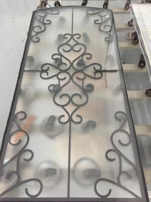 China decorative black color wrought iron glass for doors for sale