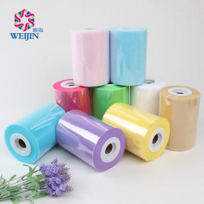 China 6 Inch Shrink-Resistant Tulle Roll 100 Yards Mesh Fabric Girl Skirt Wedding Decoration 100%Polyester Flocked Microfiber Tulle Fabric Roll Spool for sale