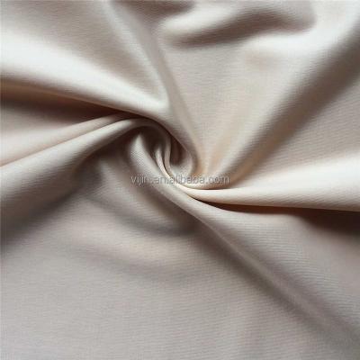 China Plain Semi-matte Satin Nylon Spandex Fabric For Garments for sale