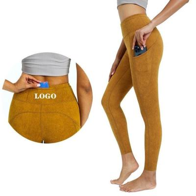 China Wholesale Breathable Fitness Clothing Female Workout Gym Wear Orange Yoga Pants Mesh High Waist Printed Leggings Size XS With Pocket for sale