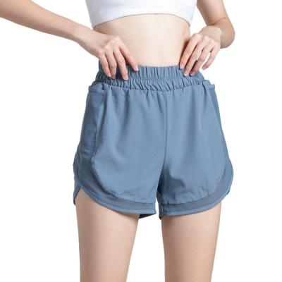 China Yoga Breathable Hot Fashion Design Loose Hot Pants Group Sports Shorts Female Open Fork Anti-go Light Speed ​​Pocket Dry Fitness Running Panties for sale