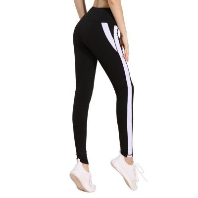 China New Two Color Yoga Women's Fitness Pants Quick-drying Breathable Sports Pants Quick-drying Casual Tight Hip-lifting Nine-point Fitness Pants for sale