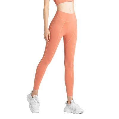 China Breathable Breathable Women Shape Exercise Yoga Retraining Stretch Waist Pants Naked Fitness Buttocks One Piece Peach Top for sale