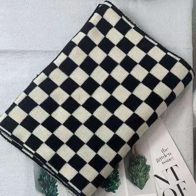 China Soft Smooth Feeling Black And White Colour Blocking Fashion Small Scarf Autumn New Checkerboard Plaid Knitted Long Scarf for sale