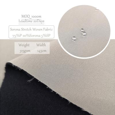 China Durable high quality polyester spandex ripstop four way stretch membrane sorona bonded fabric textured stretch fabric for jacket for sale