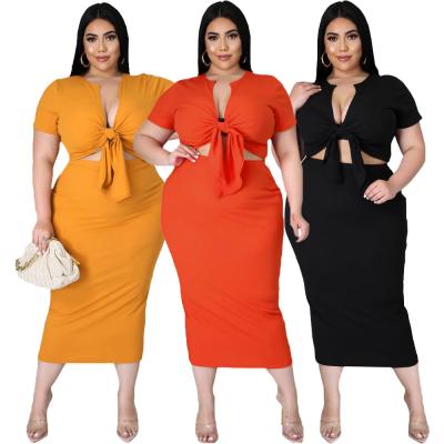 China Breathable XL-5XL Plus Size Summer Women's Two Piece Short Sleeve Clothing Bodycon Top Skirt Set 2 Piece Set for sale