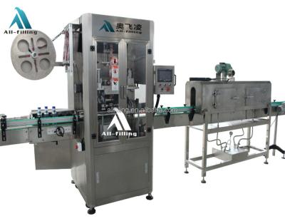 China Beverage Automatic Single or Double Heads Round Shrink Labeling Machine Multiple Packing Machine for sale