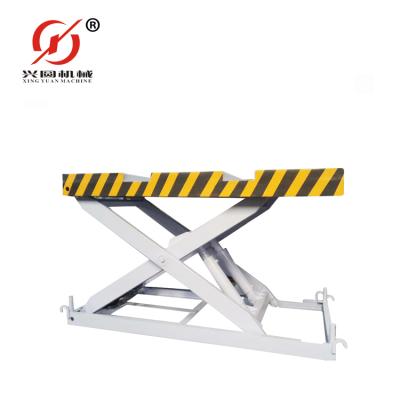 China 1300mm Guangzhou Xingyuan Hydraulic Lift Table Fxed Hydraulic Scissor Lift Table for sale