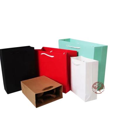 China Recyclable Large Size Luxury Clothes Packaging Paper Bag With Your Own Logo, Recycled Brown Kraft Paper Bag, Custom Paper Bag for sale