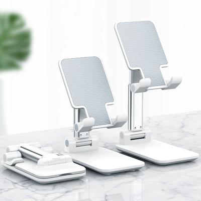 China 2021 New Mobile Phone Accessories Mobile Phone Stand Adjustable Portable Foldable Tablet Stand for sale