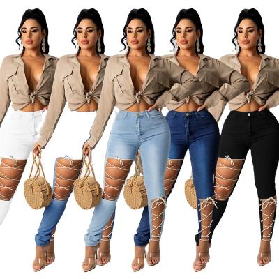 China Waterproof 2021 winter women's fashion jeans personality creative lace-up thin autumn new broken sense female exposure for sale