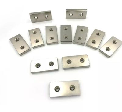 China Industrial Magnet Custom Size Shape Block N45 Super Strong Magnets Neodymium Block Shaped Square Magnets With Countersink Holes for sale