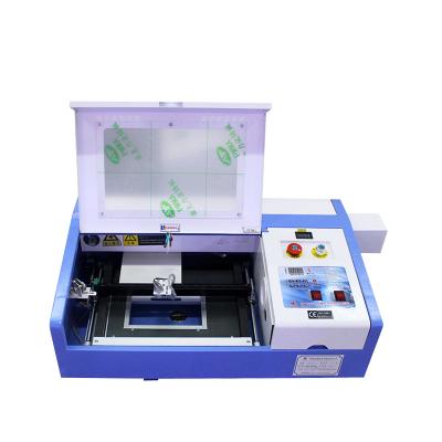 China Laser CUT 3020 Stamp Making Machine CO2 Laser Cutting Machine Laser Printer Machine for sale