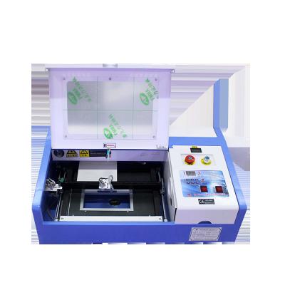 China Laser Cutter New Arrival CO2 Laser Stamp Making Machine CO2 Laser Cutting Machine Laser Printer Machine for sale