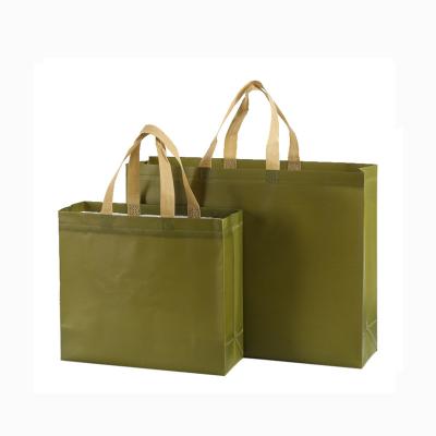 China Nonwoven Recyclable Custom Logo Can Wear Environmental Protection Shopping Bag Garment Clothing Tote Bag for sale