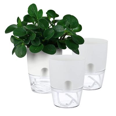 China Modern Garden Indoor Circular Transparent Flower Pot Planter Self Watering Plant Pot For Orchid Succulent Plants Home Decoration for sale